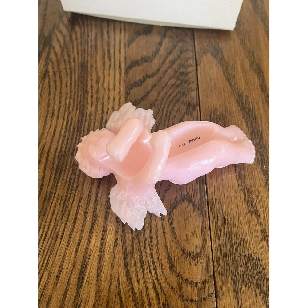 Celestial Seasonings candle cherubs